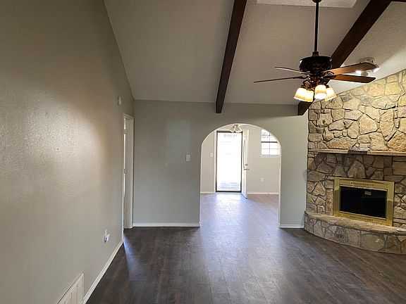 Spacious living room with fireplace