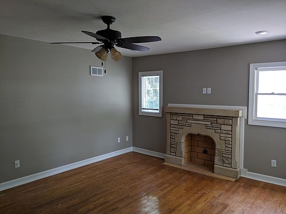Living Room - TV can be mounted in corner or above fireplace.