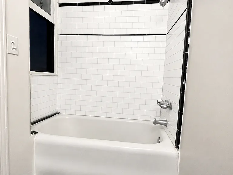 102 bathroom has new tile floors