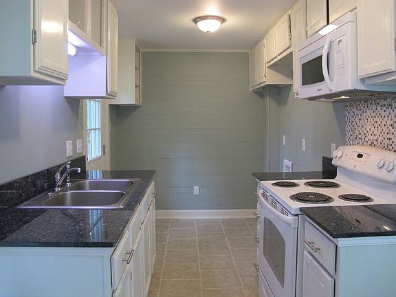 Kitchen with Granite and Tile