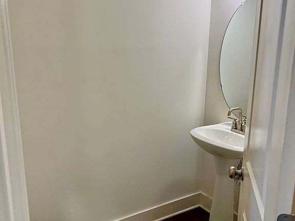 First floor half bathroom for convenience and guest access