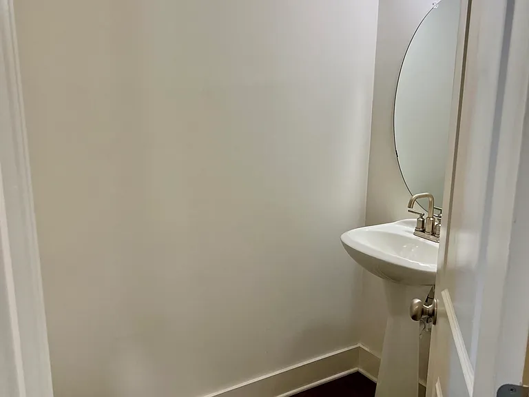 First floor half bathroom for convenience and guest access