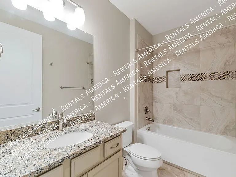 7631 W Laurel Ln — Photo 6
