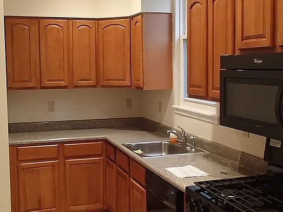 3rd image of 209-211 E 7th St