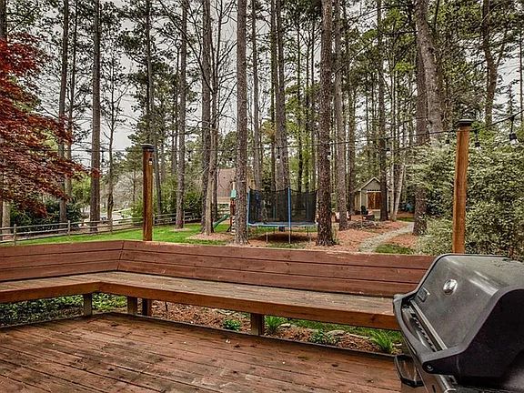 Built in seating on the huge deck plus the shed out back fully wired with electricity.