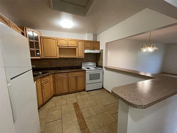 4th image of 10702 Royal Palm Blvd #11