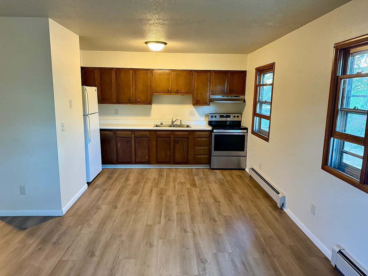 Kitchen is open to living room - 114 E Philadelphia St #1