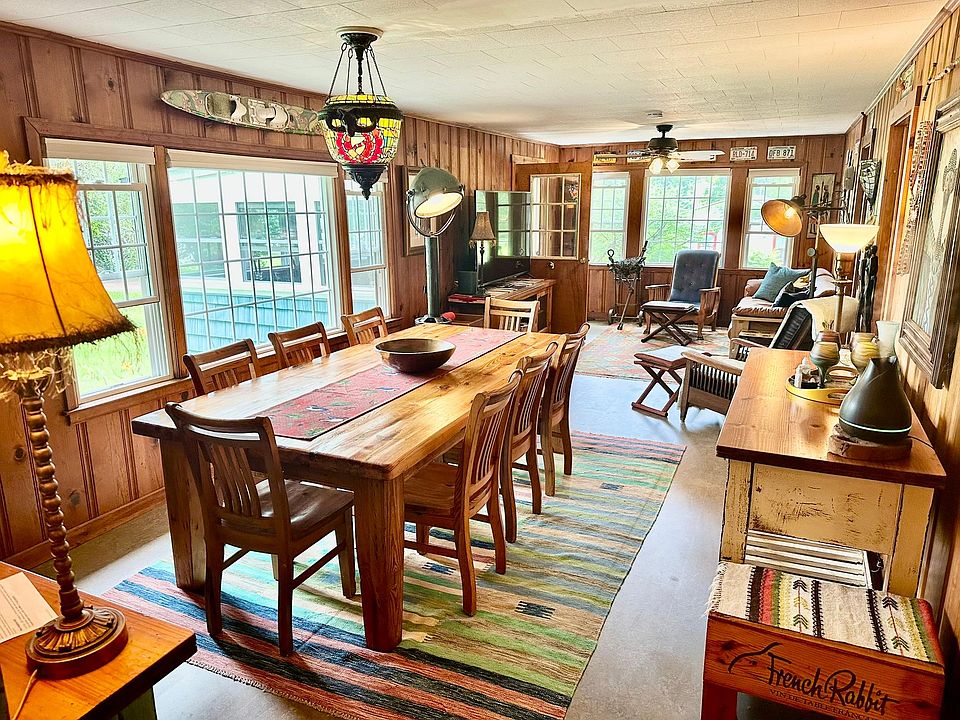 Main living area featuring vintage rich knotty pine panels.