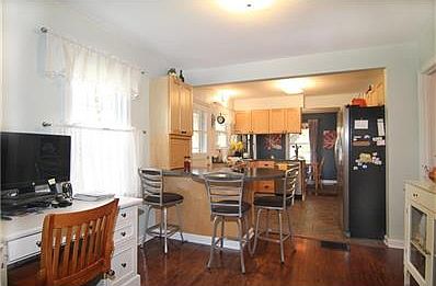 Another view of Kitchen with built-in breakfast bar