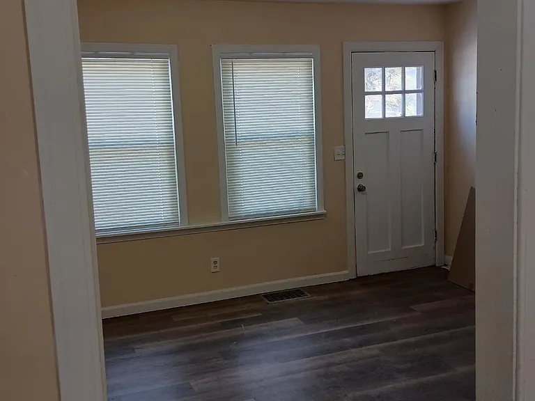 View from kitchen looking into living room and front door
