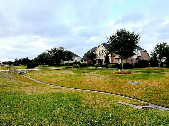 Huge private lot is 1+ acre in size. Extensive landscaping.