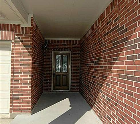 The walkway to the front door. This is a perfect spot for decor, outdoor seating, etc.