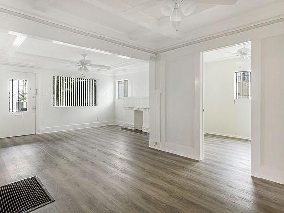 Living room, dining room area + bonus room (could be made into an office.)