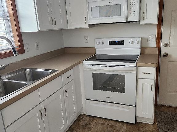 New appliances, flooring , cabinets, countertop, sink & faucet.