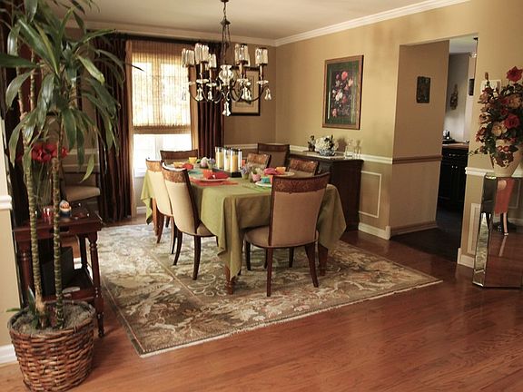 Formal Dining Room
						:
						Sliding doors lead to extended deck.
