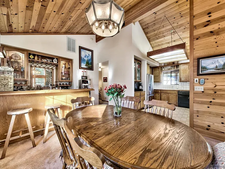 Dining area, bar and kitchen.