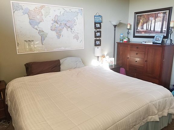 bedroom with plantation shutters