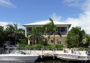 Large concrete waterfront home
