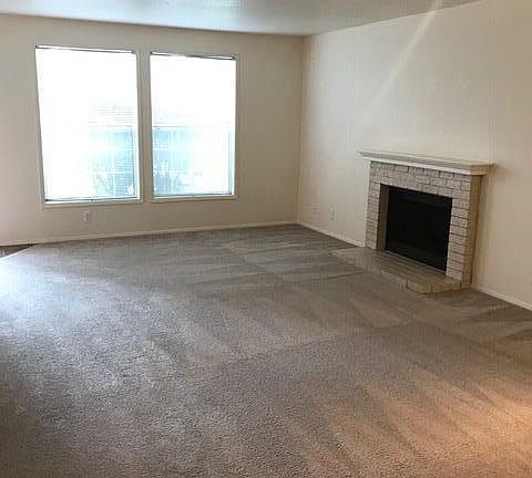 Living Room with wood burning fireplace