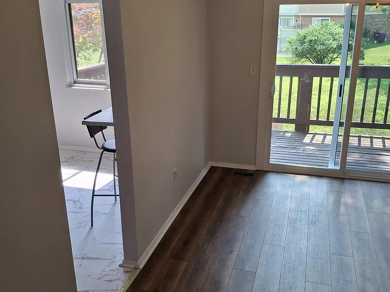 Dining Room with access to Kitchen with Breakfast Bar.