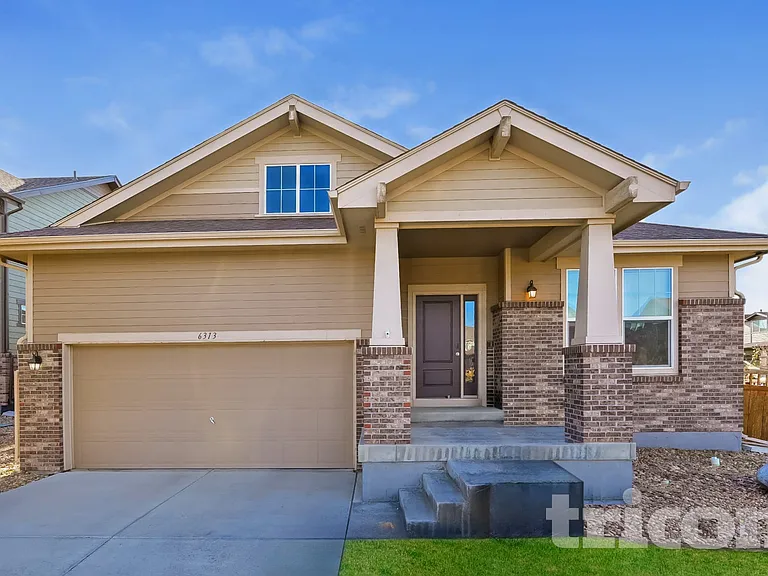 6313 N Genoa Way — Photo 1