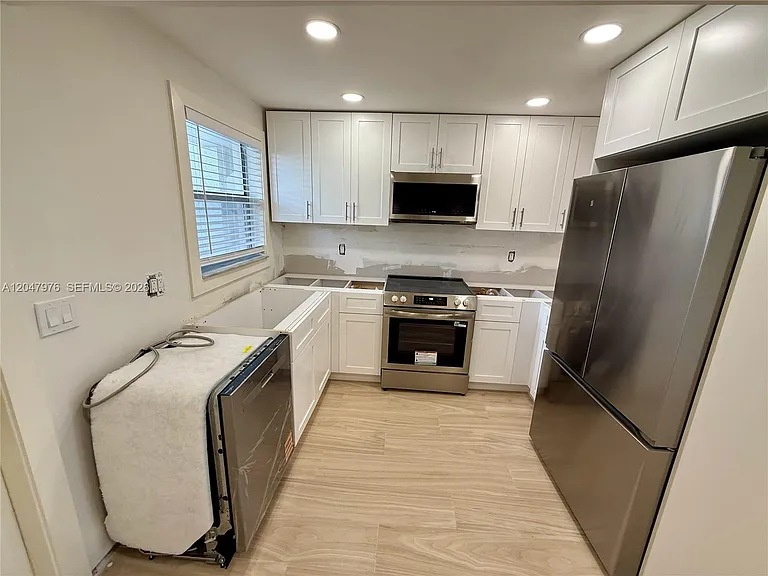 8600 Sunrise Lakes Blvd #102 — Photo 4