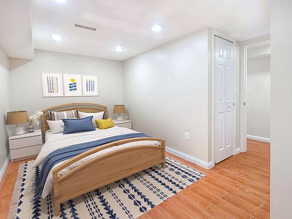 Bedroom 1. This image shows a virtually furnished space. Bedrooms come unfurnished.