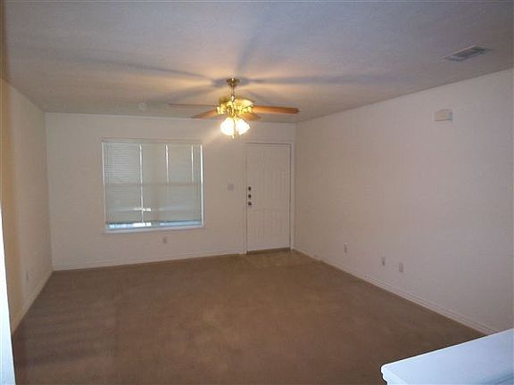 View of large open livingroom from kitchen