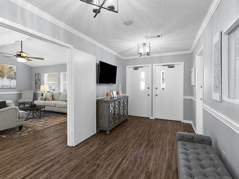 A welcoming community room where residents can gather and connect at Lakeland East Apartments in Flowood, MS. Managed by Highlands Vista Group.