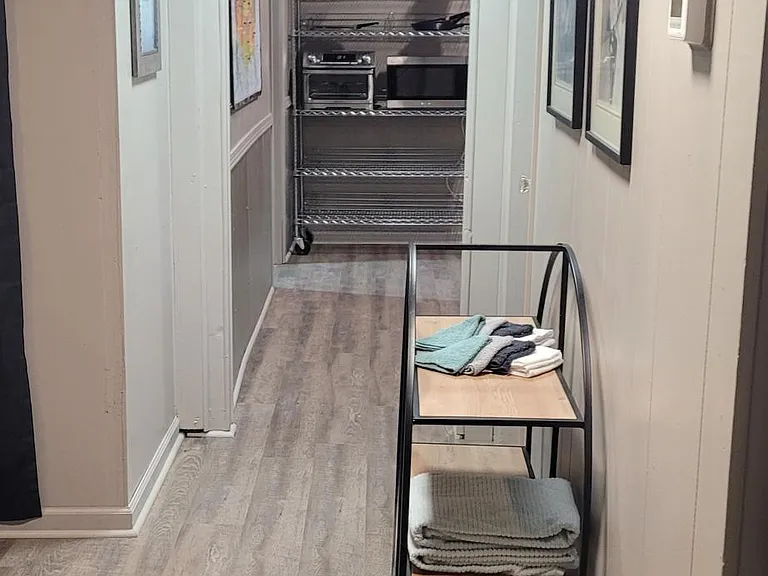 Hall thru to the full kitchen.