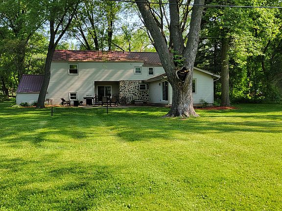 Backyard- gas grill, 6 rocker seated table, kids picnic table, 2 rocking chairs fire table..pickleball net!