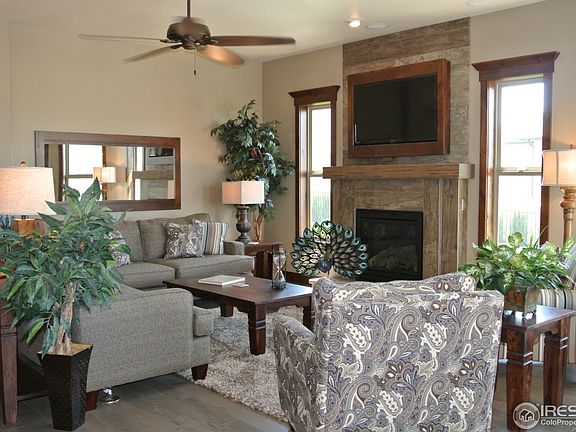 Main floor living room/great room area w TV