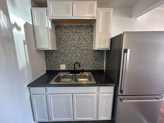 Brand new kitchen with full size stainless steel appliances