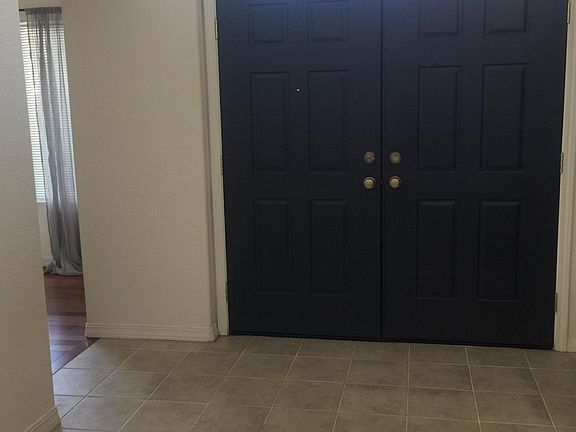Double front doors And foyer