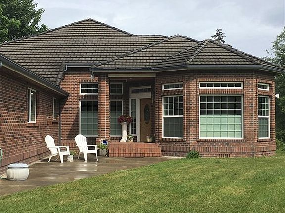Welcome Friends!  Beautiful brick front greets guest.