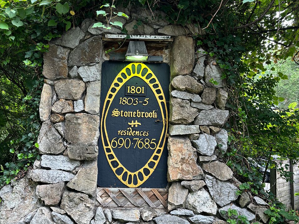 Stonebrook Residences sign at entrance.