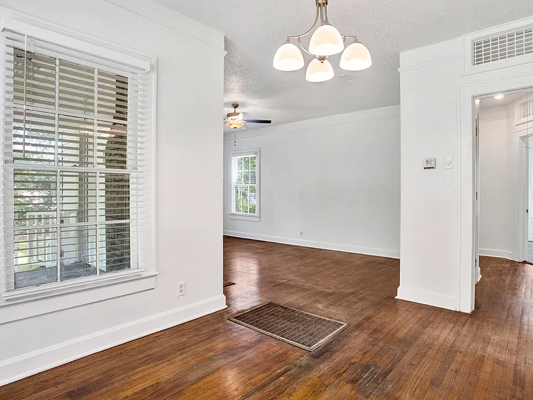 Dining area. Porch is through the window to the left. Living room is straight ahear.