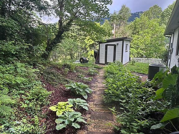 Southern gardens and path to shed