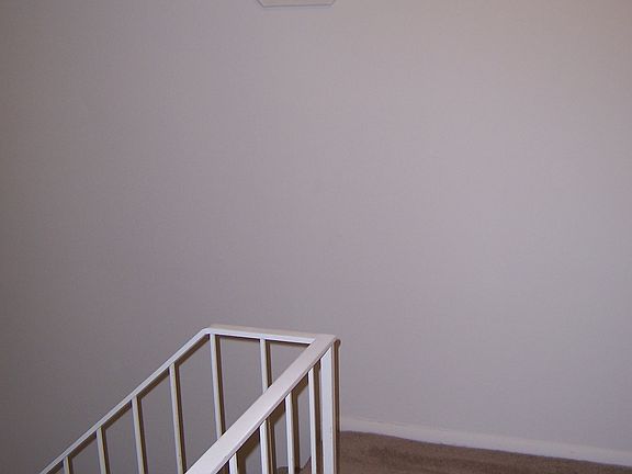 Top of stairs showing window