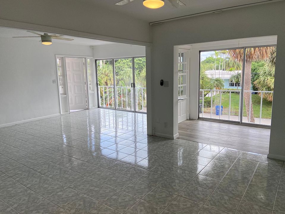 main room, very bright natural light, ceiling fans in every room