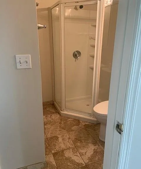 2nd Bathroom with Standup Shower next to 2nd Bedroom on the right as you enter