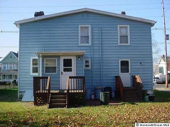 Apartment 2 has front and back entrances and a large deck and patio that is for exclusive use of tenant