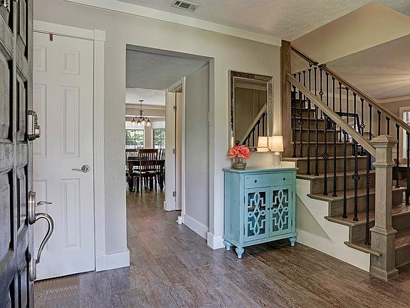 Entrance view as you enter this beautiful home. Bonus room to the left and dining room to the right.