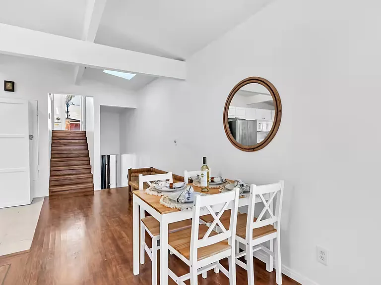 Dining table adjacent to the living room and the Kitchen