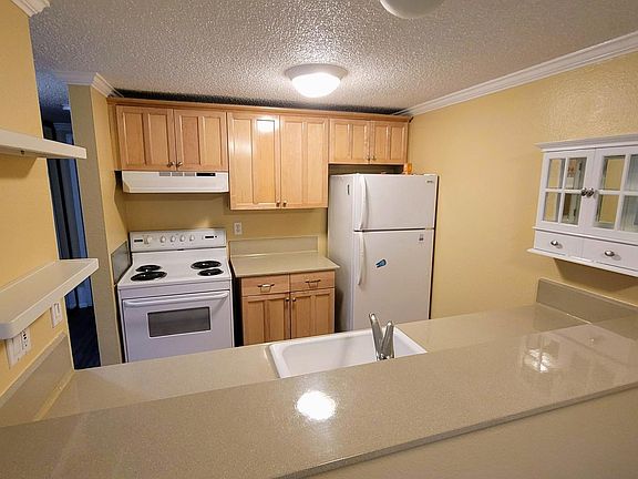 Kitchen with barstool countertop