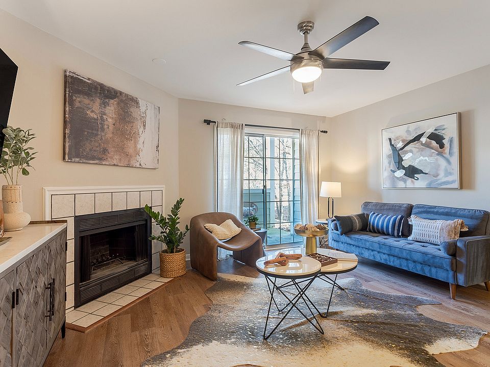 Newly Renovated Living Room with Hardwood-Style Flooring