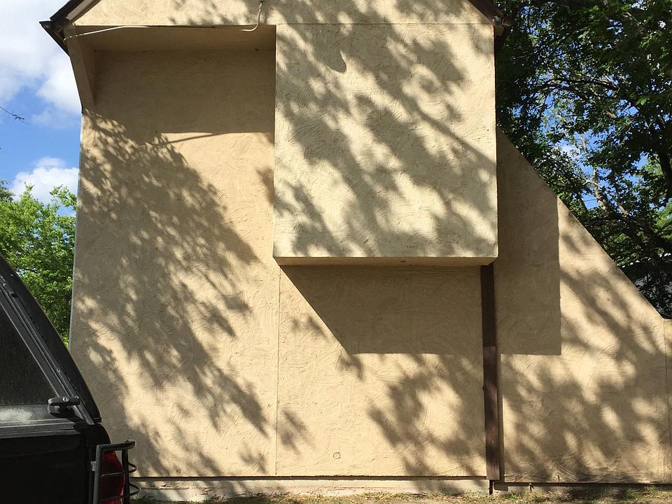Side of building and parking lot