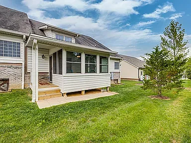Exterior of Sunroom and Private Backyard