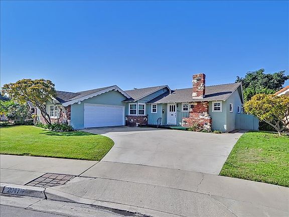 Plenty of parking for up to 5 cars. Two car garage plus extended driveway.
