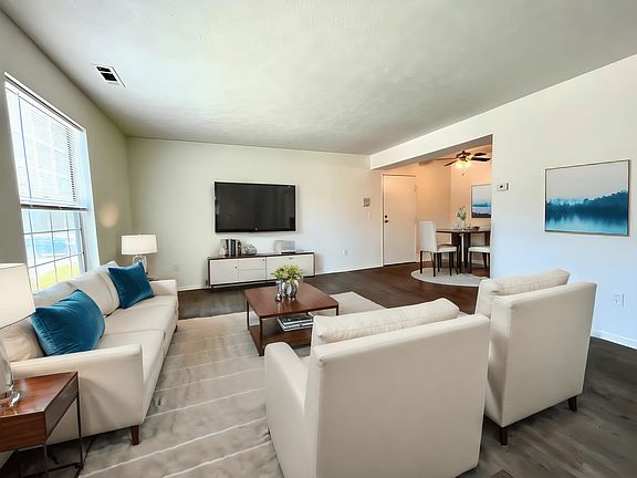 Virtually staged renovated living / dining
